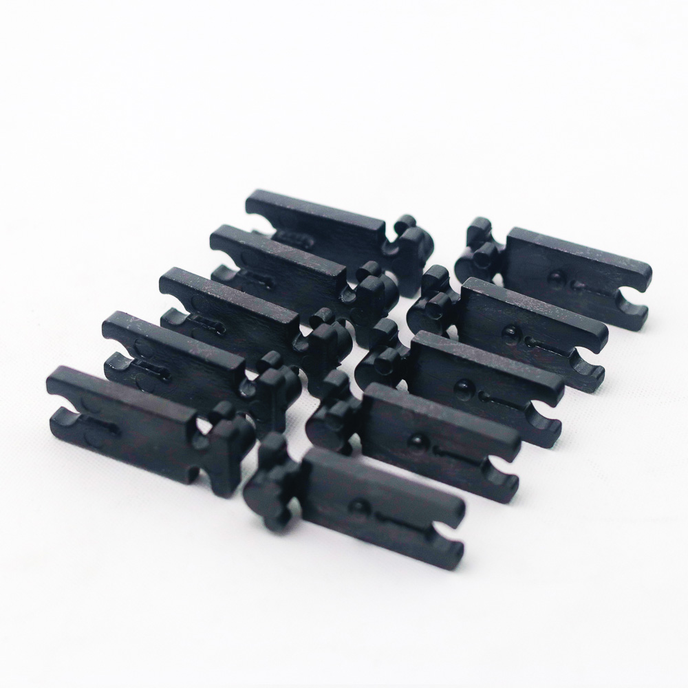 clip-monedero-x-10-u-n-repuestos-maquinas-casino-sistemas-de-aceptacion.jpg Black polystyrene plastic coin hopper clip x 10 pcs. - Image 1